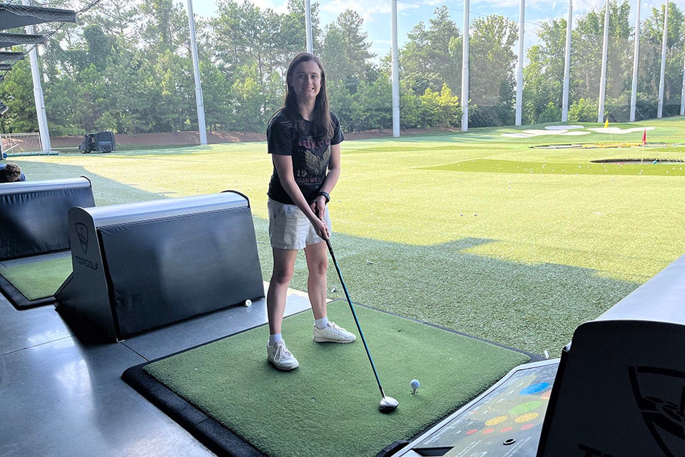 Introduce kids and teens to a sport like golf while having a family hang at Topgolf Atlanta.