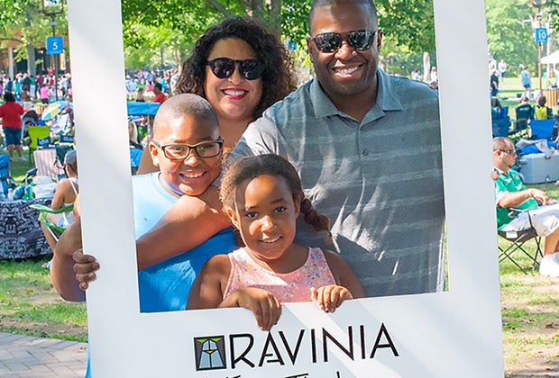 Family enjoying the Ravinia festival in North Shore, a fun day trip from Chicago