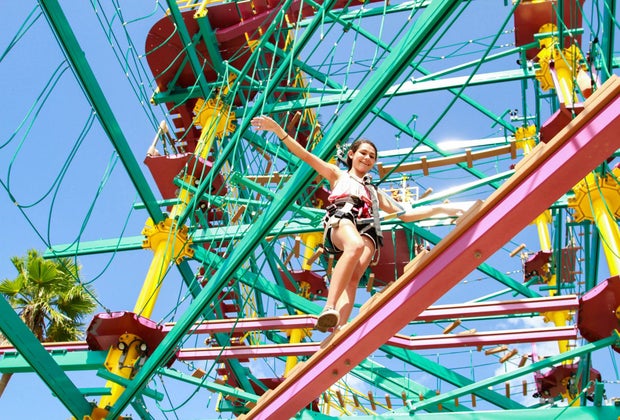 Climb around at Moody Gardens' zipline and ropes courses.