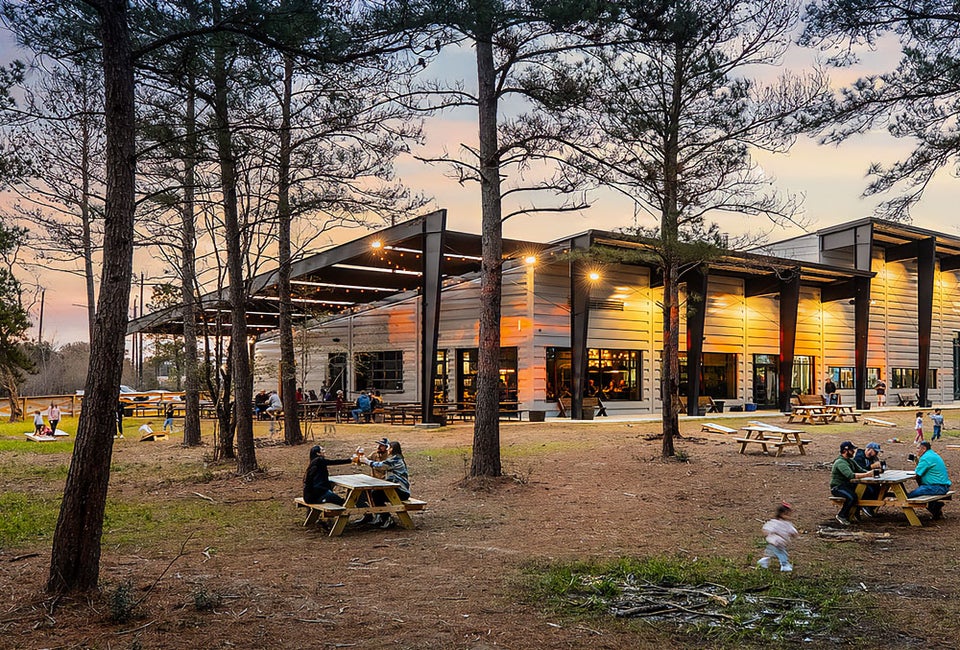 Families enjoying a night out. Photo courtesy of Paradigm Brewing in Tomball