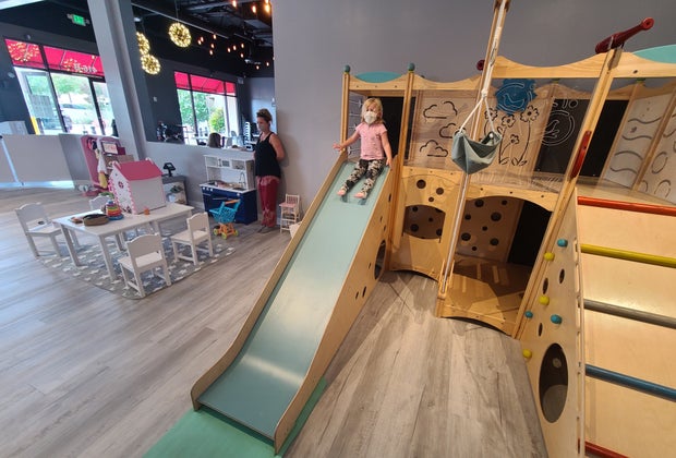 Wheee! Slide, play, and eat at My Little Paris.