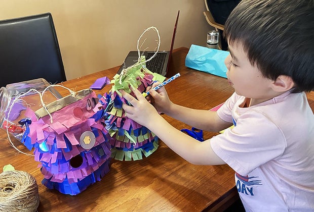 Paper bag pinatas are so easy to make, little kids can join in the fun. 