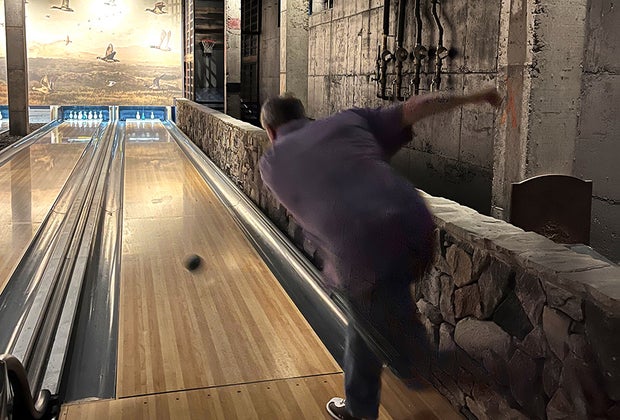 a man Duckpin Bowling