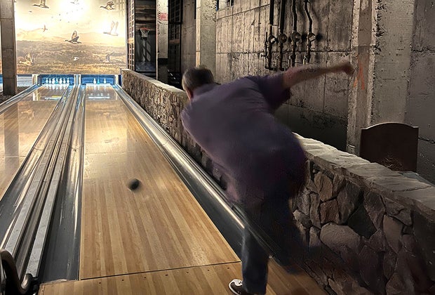 a man Duckpin Bowling