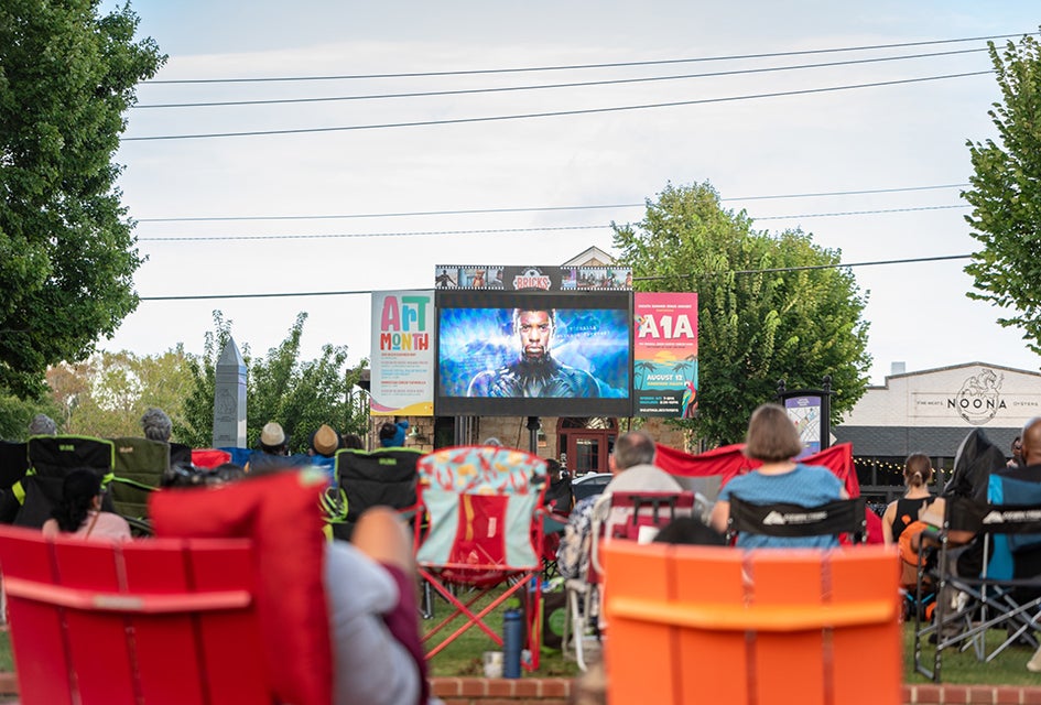 Purchase dinner from local restaurants or pack one from home for Duluth's summer movie series, Flicks on the Bricks. Photo courtesy of the event