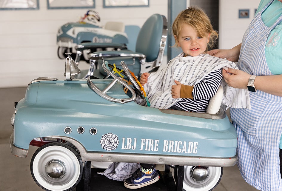 The Little Bluejay has some super cool rides for your kid to enjoy while getting a haircut. Photo by Emily Baas
