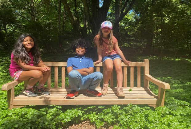 Image of children on a bench - Visit Bartlett Arboretum like a local.