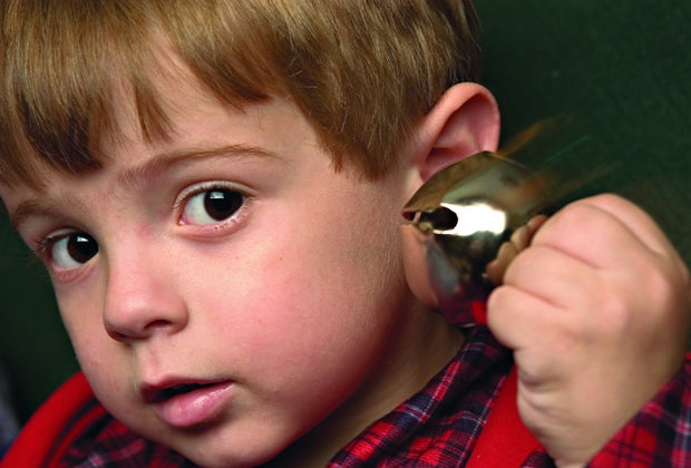 Santa brings a bell as a gift on Grand Canyon Railway's Polar Express