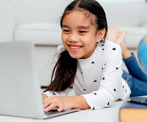 Online tutoring services remove the stress of commuting to a learning center with on-demand tutors. Photo by Mommy Poppins