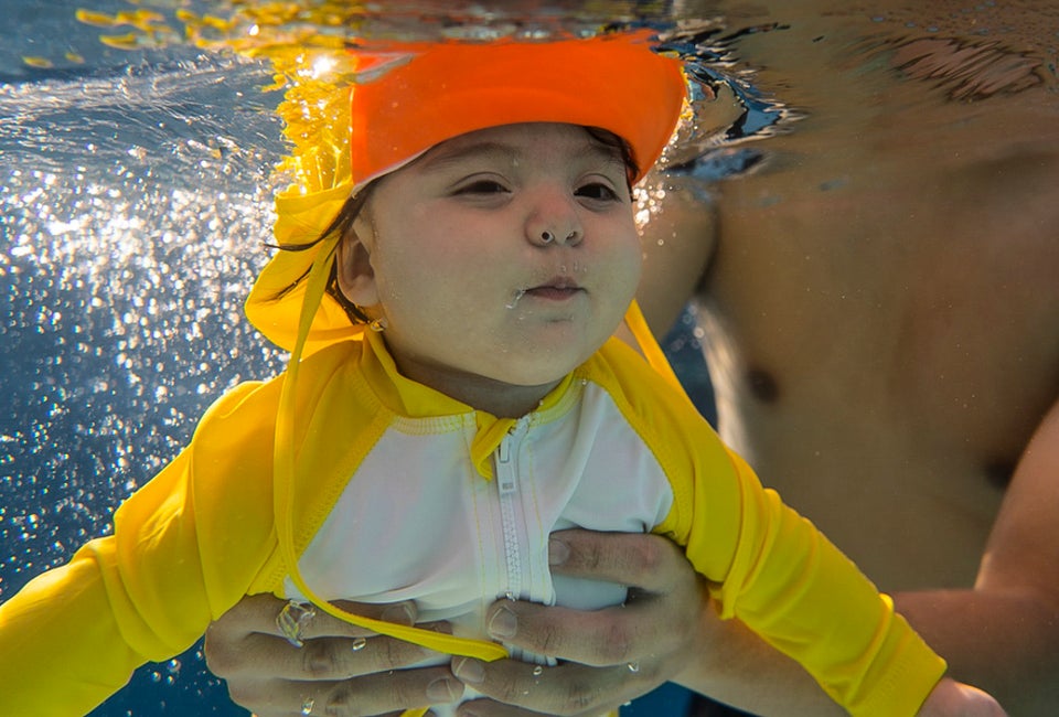 Baby swim classes get LA kids water safe, from a very young age. Photo courtesy of the Blue Buoy Family Swim School 