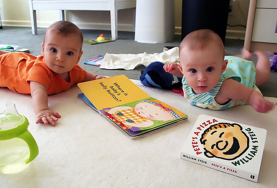 Babies love books; sure they may treat them as toys or food at first, but a love of reading will come.