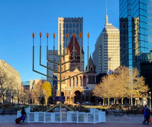 Head to Boston in 2024 for holiday festivals and seasonal displays! The menorah in Copley Square. Photo by Leslee/Flickr 2.0