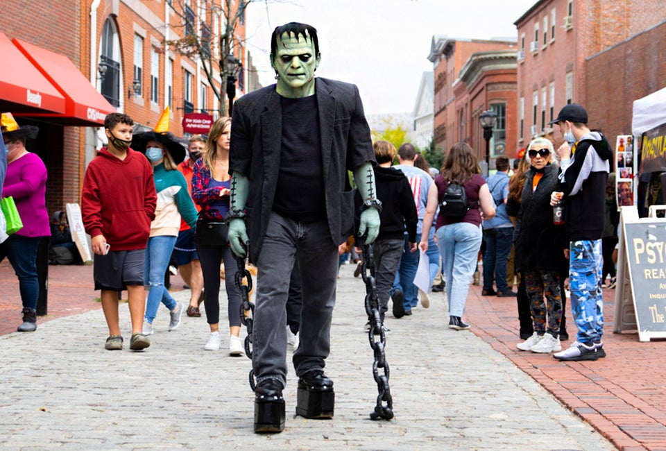 Get out and about to see some great Halloween events for free in 2025! Frankenstein on Essex Street in Salem, photo by Kate Fox.