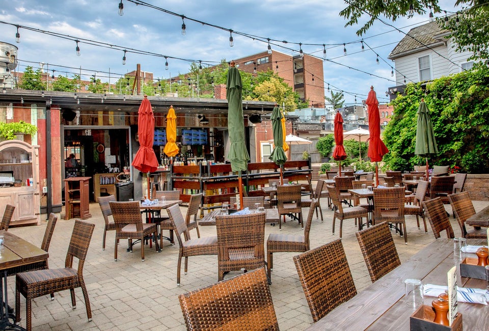 Best Outdoor Dining in Boston at Family-Friendly Restaurants Play a game of Jenga or cornhole before dinner at The Bowery Bar. Photo courtesy of The Bowery Bar
