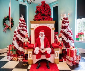 Santa greets good little girls and boys in the ballroom at Congress Hall. Photo courtesy of the venue