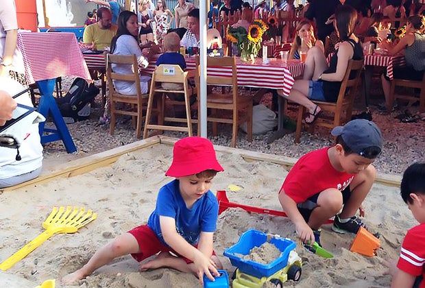 Family-friendly restaurants in NYC with entertainment for kids: Sand toys are the entertainment of choice at Brooklyn Crab