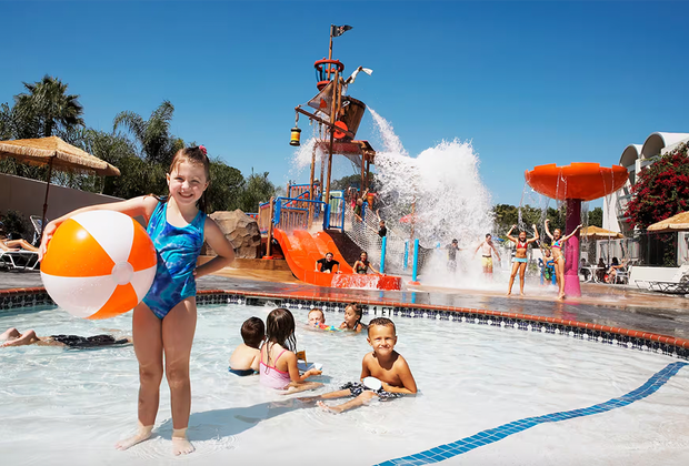 Best Kid-Friendly Family Resorts in California: CA Travel-Howard-Johnson-by-Wyndham-Anaheim-Hotel-and-Water-Playground-castaway_pool_1.avif