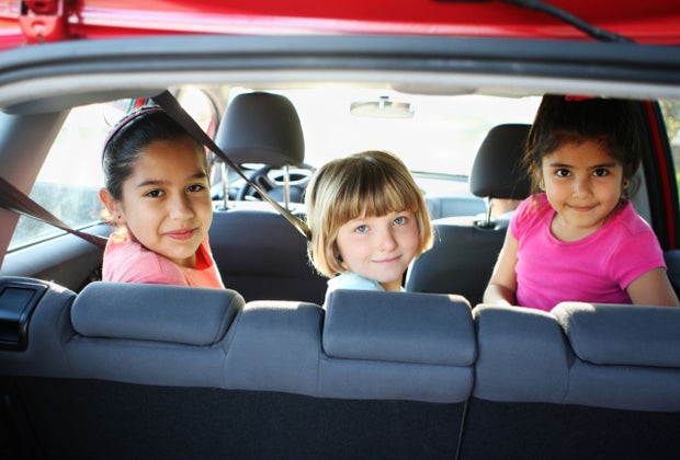 chatbots can help you figure out carpool schedules for cuties like these little girls in the back seat of a car