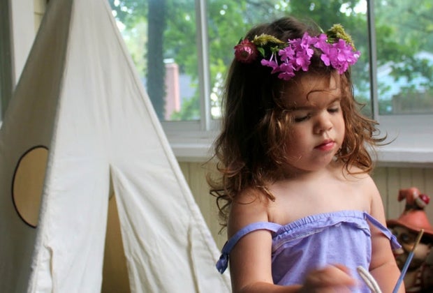 little girl in a gorgeous and natural flower crown
