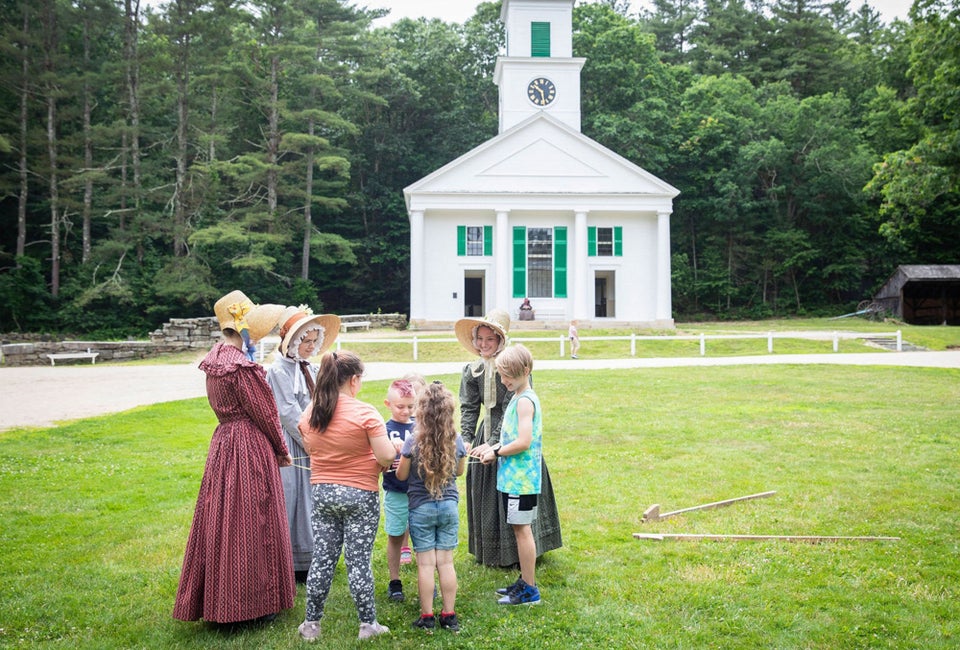 Visiting Old Sturbridge Village with Kids: Living History near Boston Take the young ones to Old Sturbridge Village to encounter history. Children Playing Games with Costumed Historians on the Common. Photo courtesy of Old Sturbridge Village