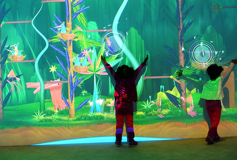Top Kid-Friendly Science Museums in New York City Kid can immerse themselves in the Connected Worlds Exhibit at the New York Hall of Science. Photo by David Handschuh