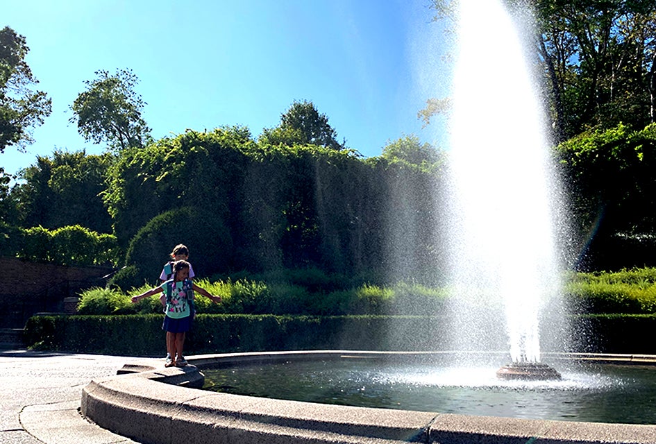 Kids can frolic around the Conservatory Garden Fountain.