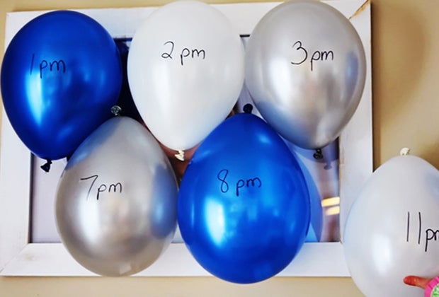 New Year's Eve balloon pops are a great way to celebrate at home with kids.