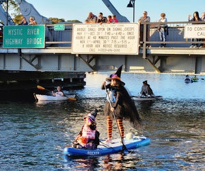 They are coming to Connecticut any way witch they can for the top things to do in October 2025 with kids! Witch Paddle photo by Kaylee Wright, courtesy of Adventure Mystic.