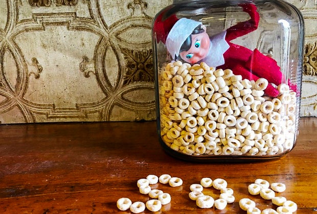 Elf on the shelf ideas for all of December, including elf trapped in a cereal jar!