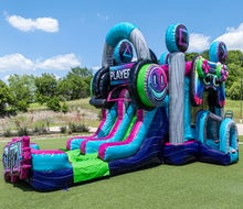 Orlando Fun Bounce's Glitch Gamer is a vibrant inflatable bounce house and slide combo, with gamer-inspired graphics and high-energy design. Photo courtesy Orlando Fun Bounce