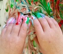 Rolling eggs in shaving cream and food dye produces gorgeous results. 