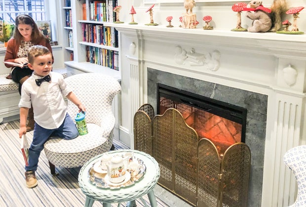 Image of family by Beacon Hill Books' fireplace, Best of Boston 2022