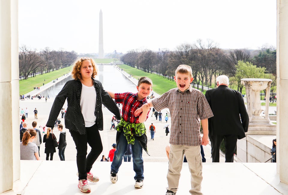Visiting Washington, DC's National Mall and Memorial Parks with Kids Climb the famous steps of the Lincoln Memorial for a gorgeous view of the reflecting pool and the Washington Monument. Photo by anjanettew via Flickr (CC BY-NC-ND 2.0)