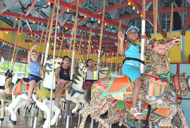 Flushing Meadows Corona Park with kids carousel