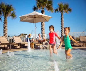 Kids can play safely in the zero-entry pool at the Omni Amelia Island Resort.