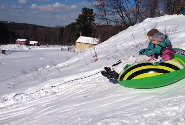 Photo of child snow tubing - Winter Activities Near Boston