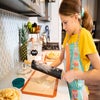 girl making apple pie courtesy of canva