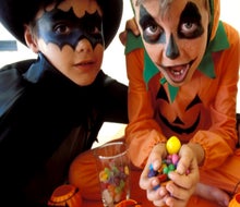 Got too much Halloween candy? We rounded up the best Halloween candy donation programs! Photo by Pixland via Canva