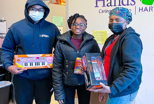 Image of high school student donating toys in Connecticut