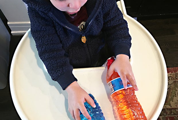 Turn a Highchair into a Baby Activity Center: A new way to recycle water bottles.
