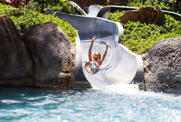 Hilton Hawaiian Village Waikiki Beach Resort girl on water slide