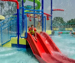 Even little ones can enjoy the slides at Strawberry Water Park. Photo by Ashley Jones