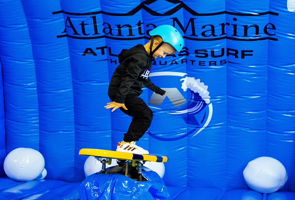 Test your surfing skills aboard a real surfboard, without ever getting wet, at this year's Atlanta Boat Show. Photo courtesy of event