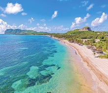 Beach, volcano, chocolate, water sports, hiking, horseback, amazing food, incredible people... why St. Lucia should be your next family vacation. Photo courtesy of Coconut Bay Beach Resort & Spa