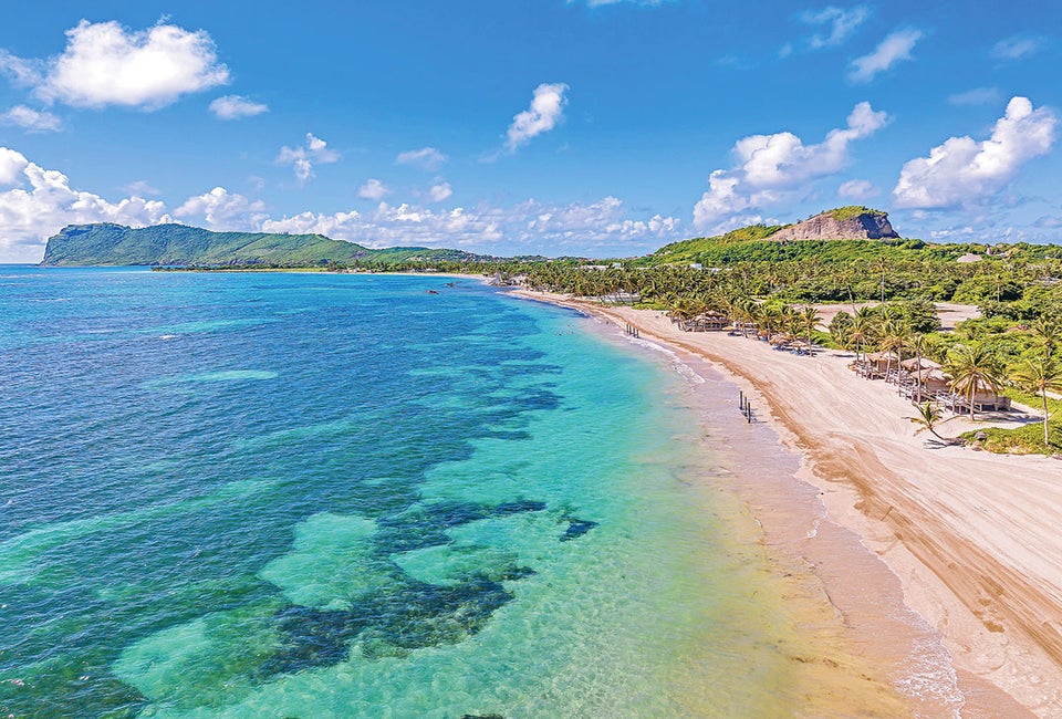 Beach, volcano, chocolate, water sports, hiking, horseback, amazing food, incredible people... why St. Lucia should be your next family vacation. Photo courtesy of Coconut Bay Beach Resort & Spa