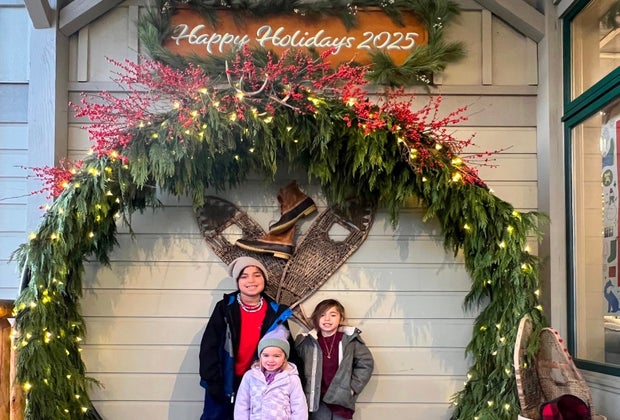 Image of children and holiday wreath - Christmas in Maine