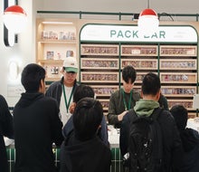 The Poké Court staff helps fans choose cards for their collections with concierge-level service. Photo by the author