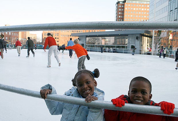 Image of kids skating in Kendall Square - Unusual Boston Christmas activities