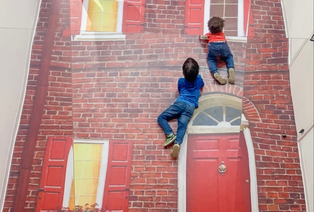 Visiting Philly's Museum of Illusions with Kids: Climb the Wall