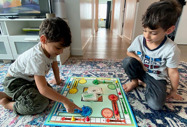 Kids playing Sorry! - not boring!